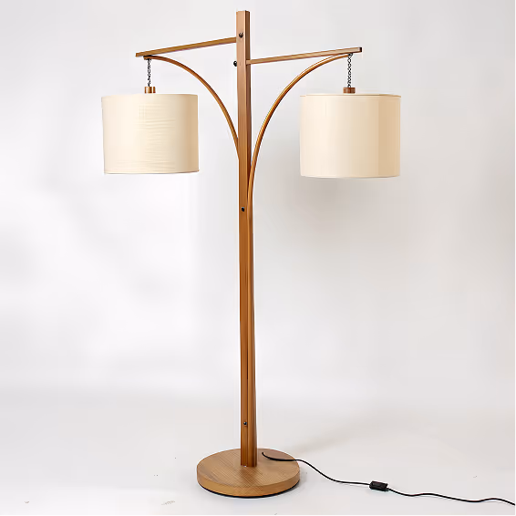 Modern wooden floor lamp with two adjustable cream-colored drum shades on curved arms.